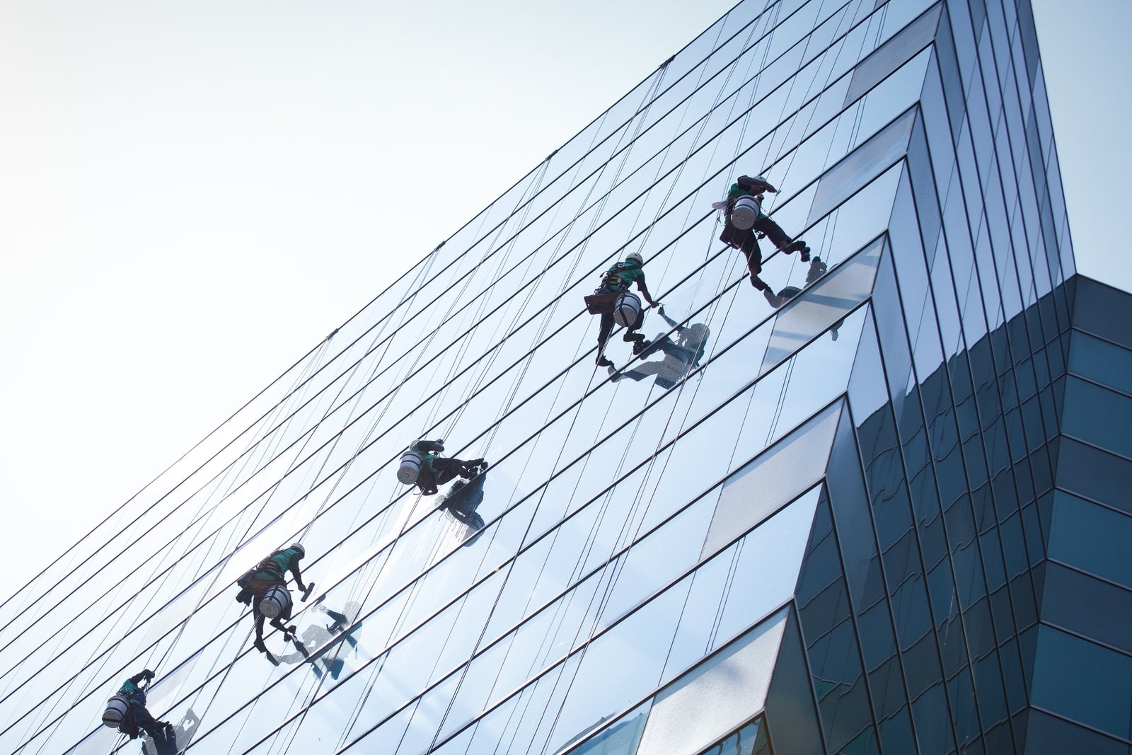 group-of-workers-cleaning-windows-service-on-high-rise-building1.jpg